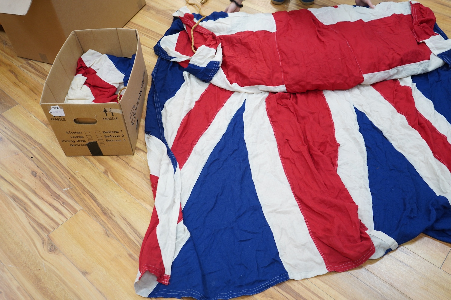 Two large Union flags. Condition - fair